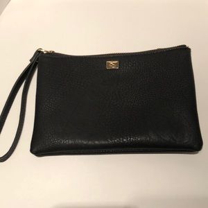 Black faux leather wristlet, 7” x 5”.